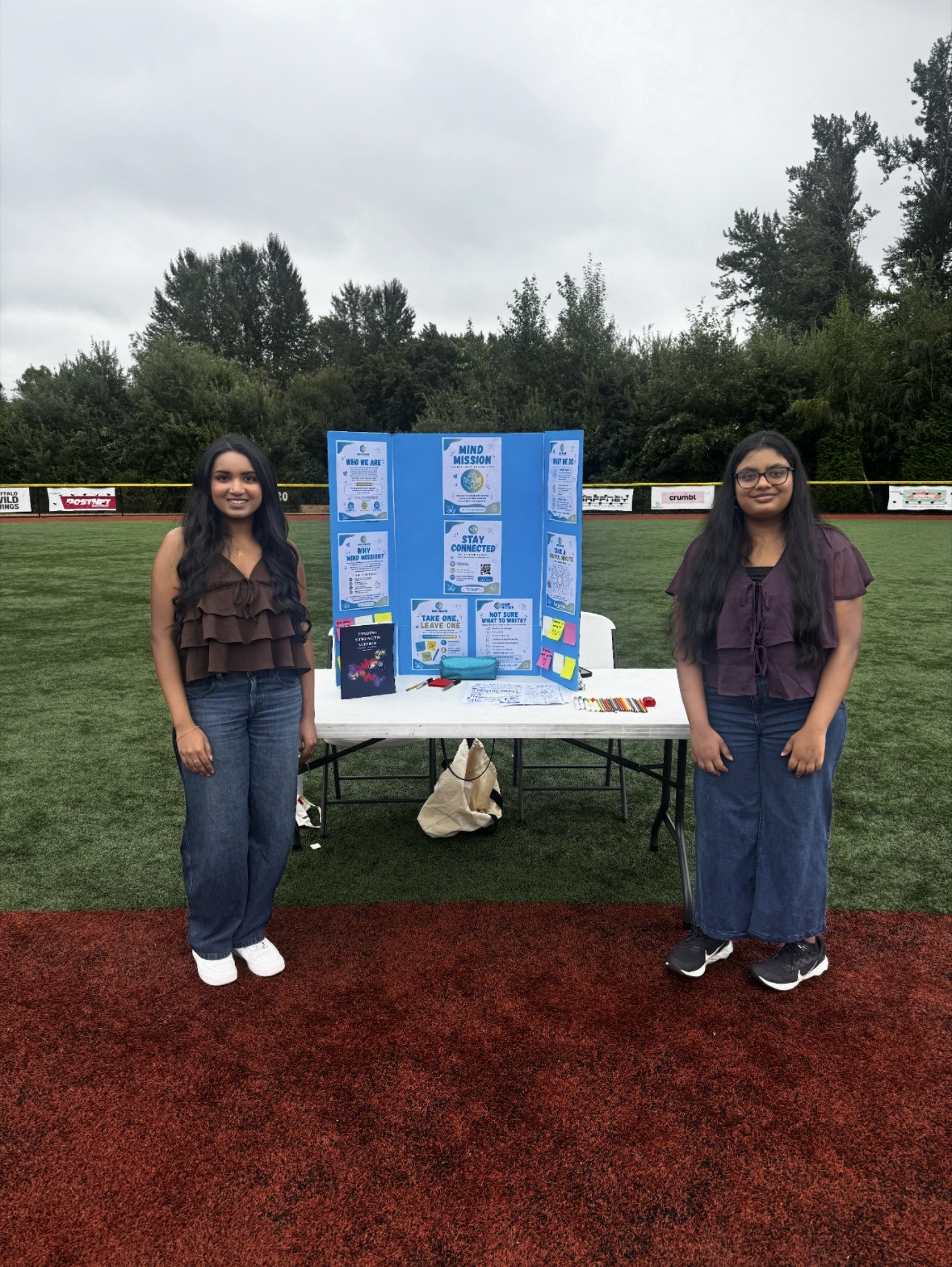 The Mind Mission team at their community outreach table