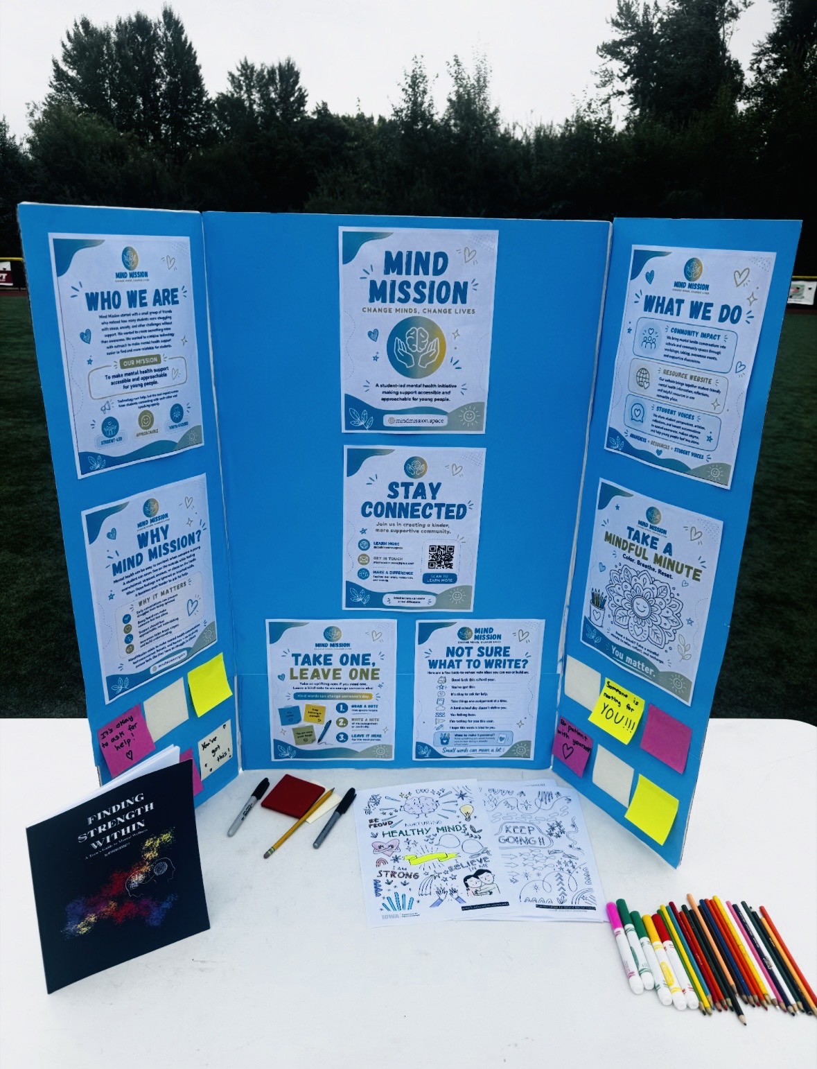 Our table set up with the note board, coloring pages, and supplies